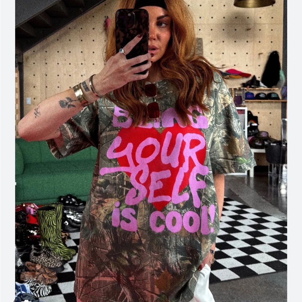 Dressed in LALA Camouflage Tee with Pink Graphic
